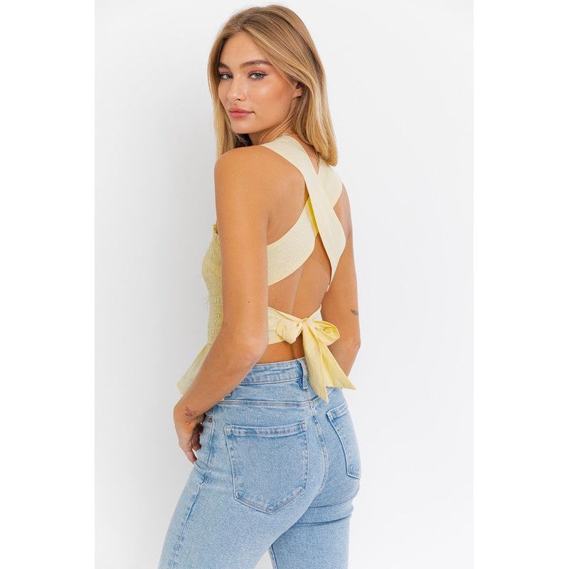 SLEEVELESS SMOCKED PEPLUM TOP
